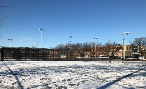 tennis court covered with snow